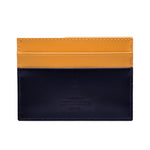 The Ettinger Bridle Flat Credit Card Case features two-tone bridle hide leather in yellow and dark navy, visible stitching, embossed branding, and multiple card pockets for organized storage.