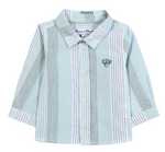 The Tartine et Chocolat Baby Boys’ and Toddler Badge Shirt features light blue and white stripes in a classic collared button-up design, crafted from soft cotton for all-day comfort. This long-sleeve shirt is finished with a small embroidered logo on the left chest, making it perfect for casual looks.