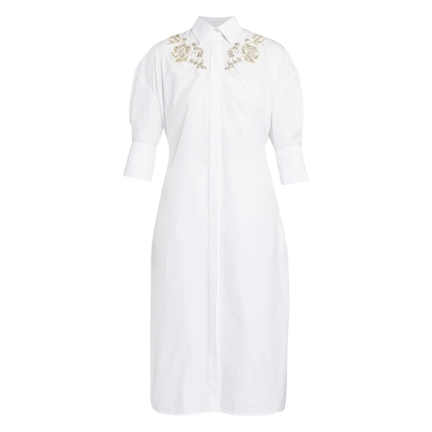 The Crystal Flower Embellished Shirt Dress by Erdem is a white cotton poplin, knee-length dress with three-quarter sleeves, floral crystal detailing on the shoulders, and a stylish tie-fastening belt.