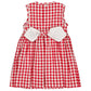 The Kidiwi Baby Girls' and Girls' Emma Smocked Dress is a sleeveless red gingham cotton dress featuring buttons and a large white bow on the back for added charm and comfort.