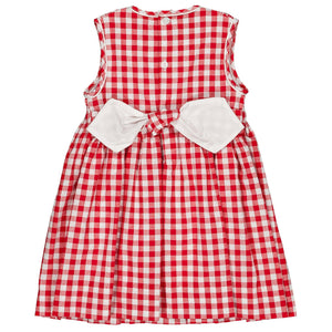The Kidiwi Baby Girls' and Girls' Emma Smocked Dress is a sleeveless red gingham cotton dress featuring buttons and a large white bow on the back for added charm and comfort.