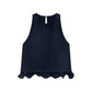 The Dorothee Schumacher Emotional Essence Top is a sleeveless black top with a keyhole back closure and ruffled georgette hem in a subtle A-line style, shown on a white background.