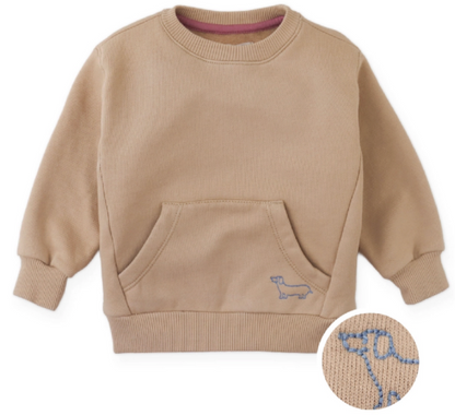 The Gingersnaps Baby Boys’ Ennio Pullover is a tan fleece sweatshirt for children, featuring a front embroidered pocket with a blue embroidered outline of a dachshund dog, shown in close-up detail.
