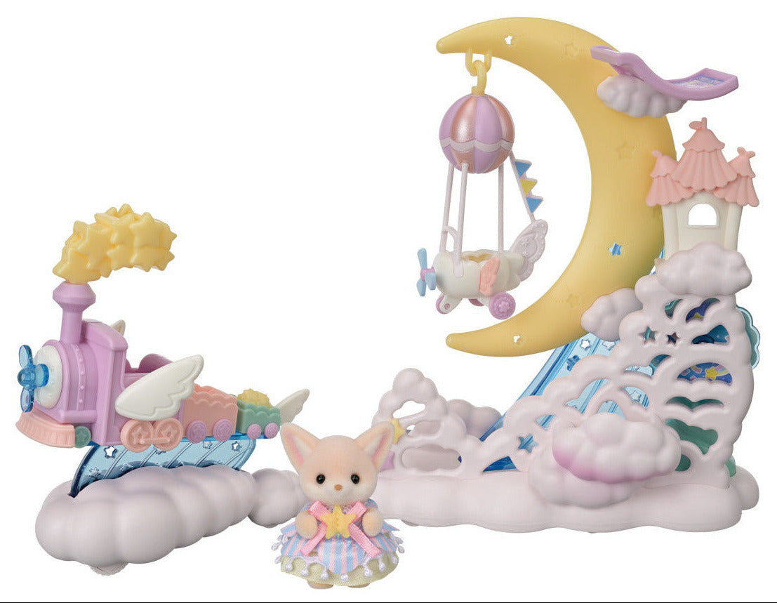 The Calico Critters Daydream Parade Playset features a pastel-colored toy train set complete with a crescent moon, fluffy clouds, an adorable animal figure, and whimsical structures that evoke a dreamy skyship or moon float in a fantasy-themed scene.