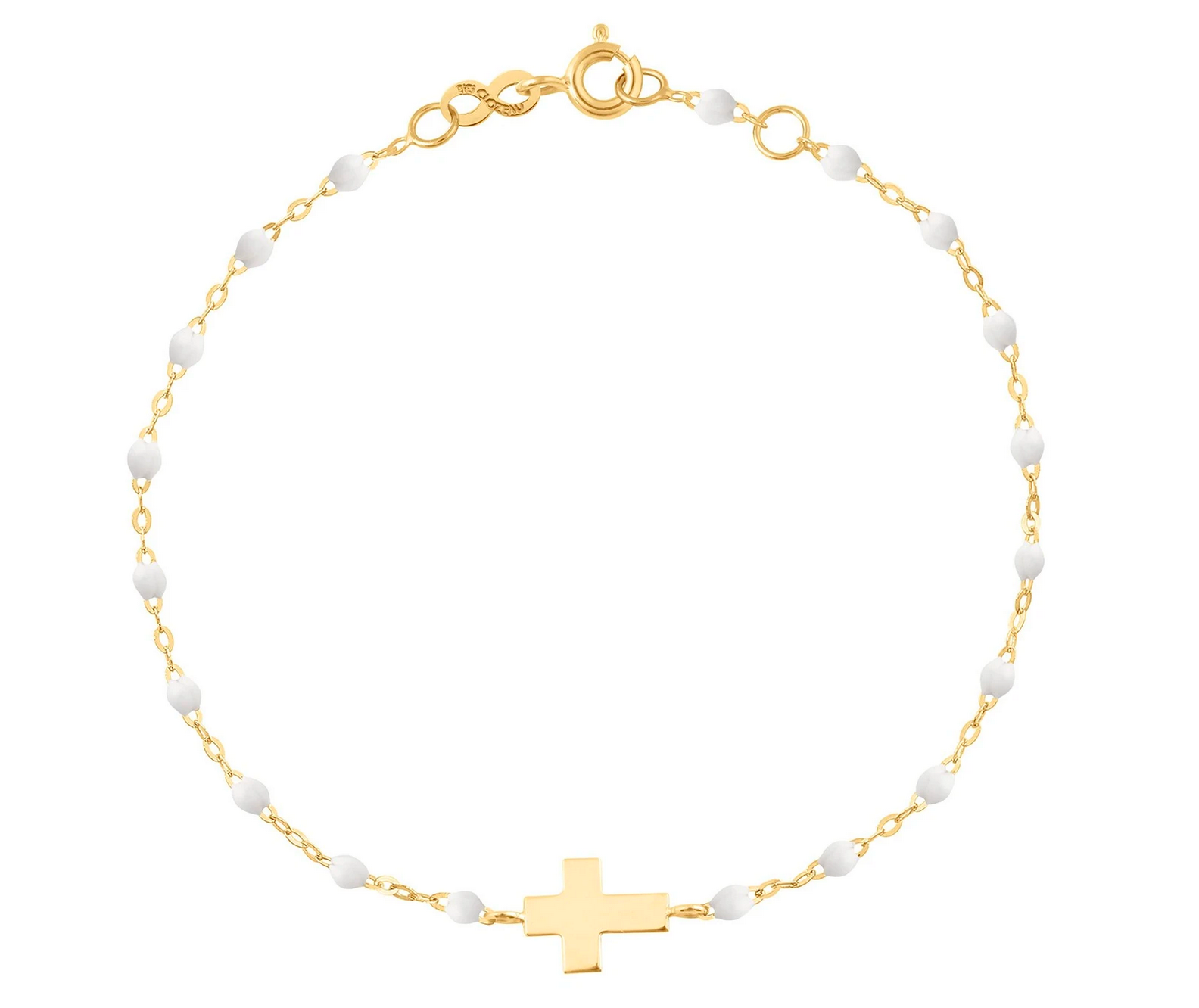 The Gigi Clozeau Classic Cross Charm Bracelet 6.7" features an 18k gold chain, elegant resin pearls, and a central cross charm, offering a timeless design.