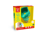 The Hape Magic Music Conch, designed for ages 1-3, comes in yellow and teal packaging and features soothing sea sounds. The box displays a toddler enjoying this interactive toy.