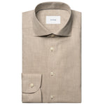 The Slim Wide Spread Solid Signature Flannel Shirt by Eton is a beige cotton flannel dress shirt with a spread collar and buttoned cuffs, ideal for cold weather and featuring the signature Eton label inside the collar.