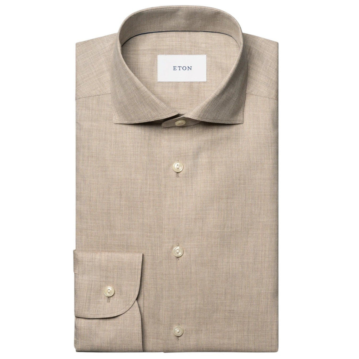 The Slim Wide Spread Solid Signature Flannel Shirt by Eton is a beige cotton flannel dress shirt with a spread collar and buttoned cuffs, ideal for cold weather and featuring the signature Eton label inside the collar.