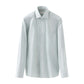 The Eton Mid Green Houndstooth Elevated Twill Shirt is a collared, long-sleeve button-up crafted from organic Supima cotton, shown on a plain white background.