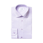 A neatly folded Solid Signature Oxford Shirt by Eton in light purple cotton, featuring a spread collar and buttoned cuffs, displayed on a plain white background.