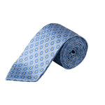 The Eton Floral Woven Silk Tie features a blue background adorned with an intricate yellow and navy circular pattern, elegantly rolled and displayed on a white surface—an ideal accessory for bringing refined business sophistication to any wardrobe.