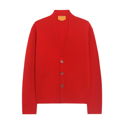 The Everywear Cardigan by Guest in Residence is a red cashmere V-neck cardigan with three buttons, shown on a white background.