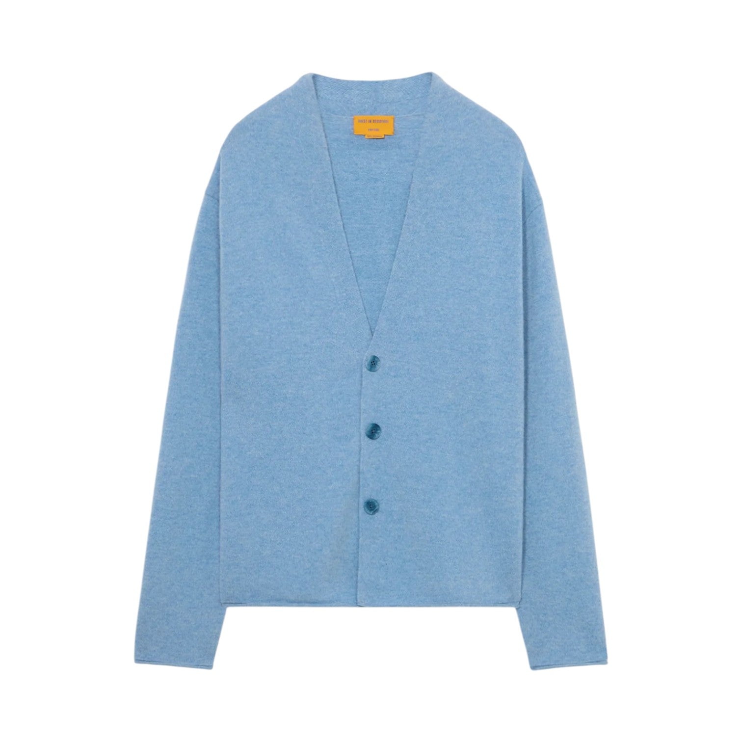 The Everywear Cardigan by Guest in Residence is a light blue cashmere V-neck sweater with three front buttons and long sleeves, shown on a plain white background.