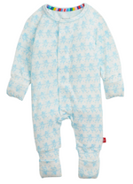 Introducing the Baby Trunkettes Modal Convertible Coverall by Magnetic Me—a light blue baby coverall featuring a subtle animal print, long sleeves, covered feet, and a vibrant striped collar lining. Made from sustainable modal fabric for remarkable softness and comfort, this coverall offers a convenient front snap closure and is accented with a small red tag on the leg.