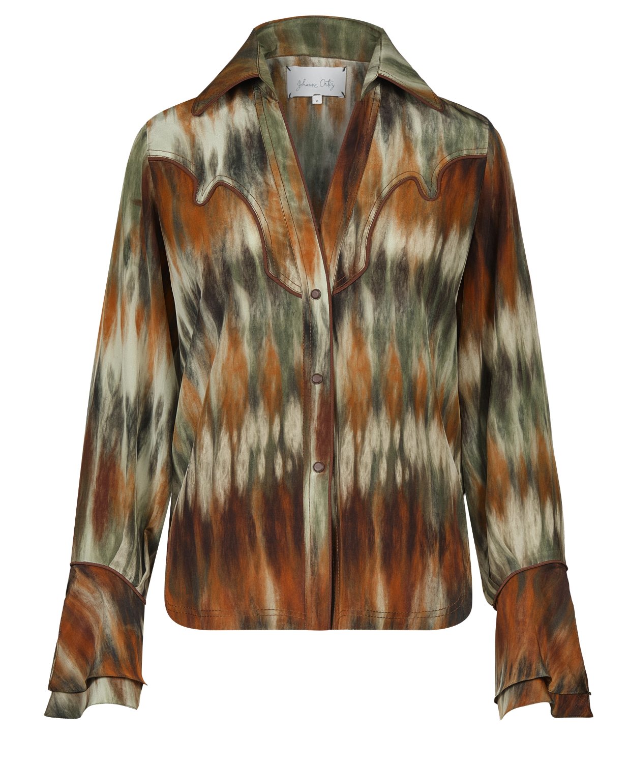 The Cabalgando Shirt by Johanna Ortiz is a long-sleeve silk CDC button-up blouse with retro green, brown, and cream tie-dye, classic collar, and flared cuffs—perfect for effortless spring style.