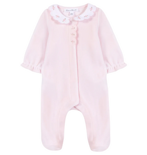Tartine et Chocolat Baby Girls’ Velvet Peter Pan Collar Pajamas—a pink long-sleeve sleeper featuring a charming Peter Pan collar, delicate embroidered flowers, ruffled cuffs, and footed legs—is displayed against a white background.