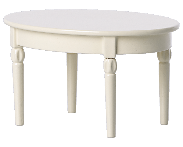 An ivory-colored, oval-shaped wooden Maileg Dining Table with four carved legs, ideal for a charming mouse castle dining setup with your Maileg mice.