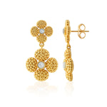 Berry Clover Convertible Duo Earrings by Juliska Capucine De Wulf feature two gold floral-shaped clusters with central white beads, shown from front and side angles on a white background.