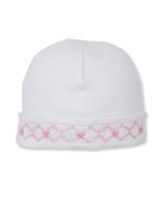 Kissy Kissy Baby Girls’ CLB Summer Bows Hat with a folded brim, made from soft Pima cotton and embellished with delicate pink embroidered diamond and flower motifs, is displayed on a plain white background. Part of the CLB Summer Bows 26 Collection, this charming piece showcases exquisite hand embroidery for an elegant finishing touch.