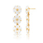 The Mermaid Garden Petite Linear Earrings by Juliska Capucine De Wulf feature three white mother of pearl flower elements with gold centers and delicate petal details, shown from front and side views—perfect as spring jewelry.