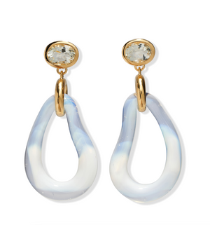 The Galina Earrings by Lizzie Fortunato feature gold-tone studs with clear gemstones and twisted, translucent blue and white resin teardrop hoops.