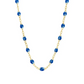 The Gigi Clozeau Classic Gigi Necklace 19.7", crafted with 18 carat Yellow Gold, showcases a delicate gold chain adorned with evenly spaced blue beads, embodying the timeless elegance of Gigi Clozeau design.