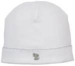 The Kissy Kissy Premier Noah’s Journey Hand Emb. Hat is crafted from ultra-soft Peruvian cotton and features a delicate hand-embroidered gray elephant near the bottom edge, finished with a simple scalloped trim.