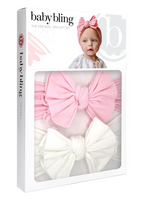 The Baby Bling 2 Pack Box Fab Knot Set: Pink+White includes two delightful bows, one in pink and the other in white, presented in packaging that makes it an ideal baby shower gift.