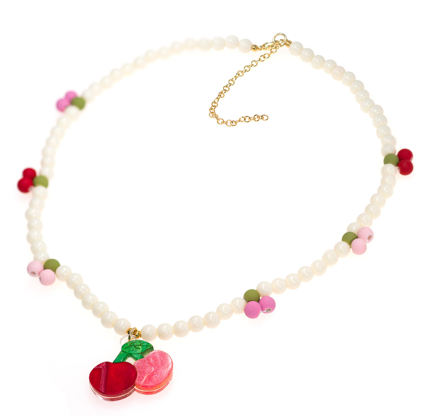 Add a touch of spring to your look with the Cherry Pink & Red Pearl Necklace by Lillies & Roses—a beaded necklace featuring delicate white, pink, and green beads, a playful cherry-shaped pendant, and an adjustable gold clasp.