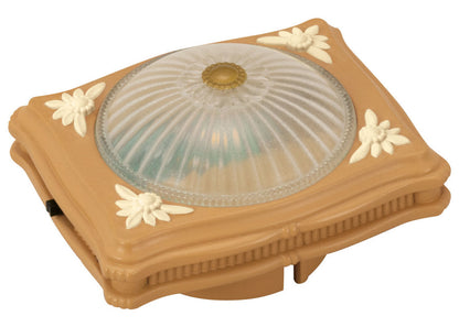 The Calico Critters Ceiling Light is a rectangular plastic fixture featuring a ribbed, dome-shaped glass cover and charming floral accents on each corner—an ideal accessory to illuminate your dollhouse décor or add a perfect finishing touch as a ceiling light for your Calico Critters home.