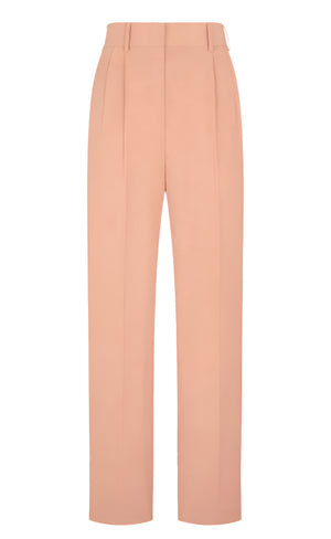 The Flica Fox Pants by Blaze Milano are peach high-waisted, straight-leg pants crafted from a luxurious silk-linen blend, featuring elegant front pleats.