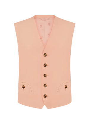 The Flica Feral Gilet by Blaze Milano is a peach sleeveless vest in a luxurious silk-linen blend, featuring a V-neck, five brown buttons, and two front pockets against a white background. Perfect for achieving a minimalist look and an ideal layering piece for spring or summer.