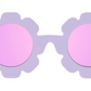 A pair of Babiators polarized flower-shaped sunglasses with pink lenses and UV protection.