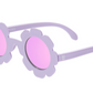 A pair of Babiators polarized flower-shaped sunglasses with purple frames and pink lenses.