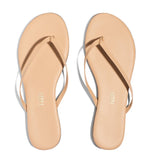 A pair of Lily Nudes sandals from the Tkees collection.