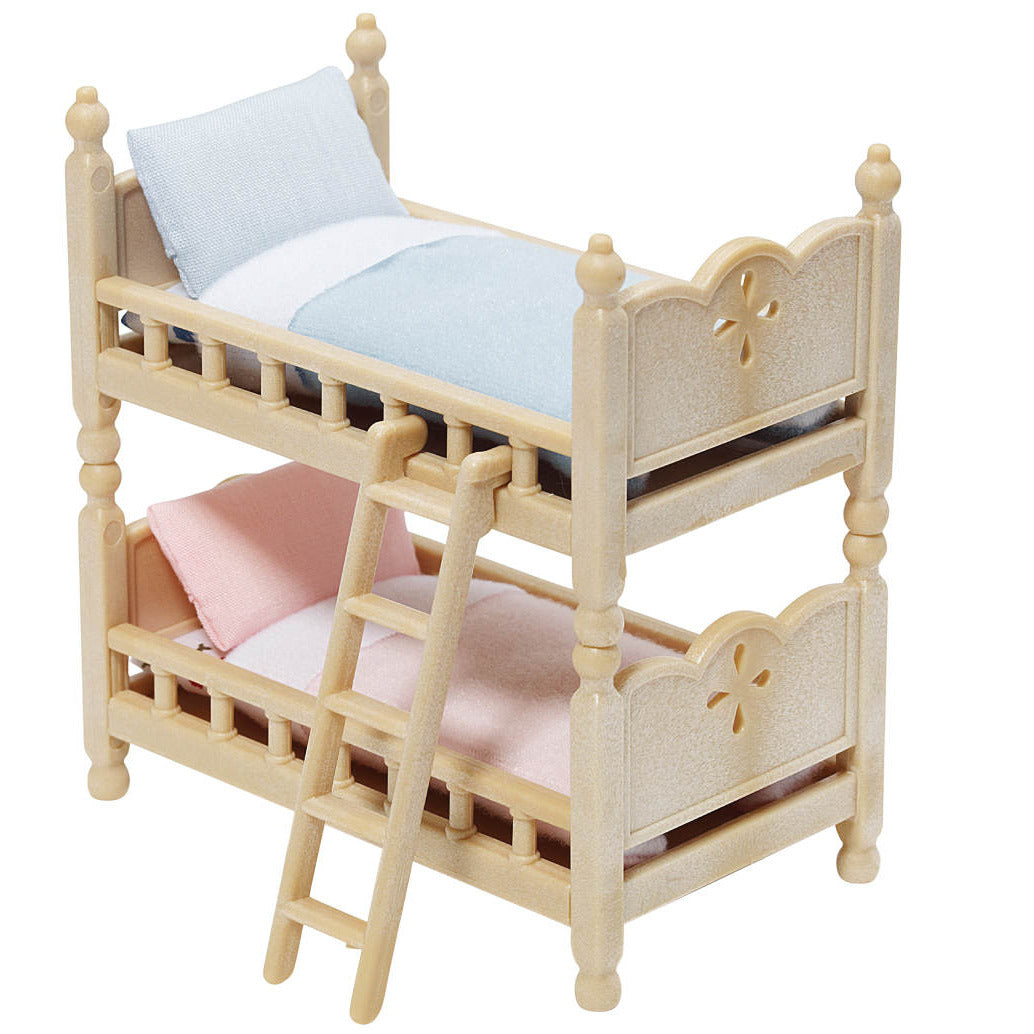 Calico Critters Stack and Play Beds—a charming miniature wooden bunk bed with a ladder, featuring a blue pillow and blanket on the top bunk and a pink pillow and blanket on the bottom—perfect as adorable dollhouse furniture or to expand your Calico Critters collection.