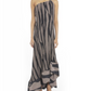 A person models the Lanvin Asymmetrical Cascade-Effect Dress—sleeveless, one-shoulder, black and beige zebra print with an integrated bustier and ruffled hem—stylishly paired with strappy sandals.