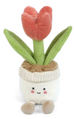 Meet Tully Tulip from Mon Ami—a plush toy shaped like a smiling flowerpot with a red tulip and green leaves. With its white pot, beige base, and tiny arms and legs, Tully Tulip is an adorable cuddly flowerpot friend for all ages.