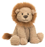 The Jellycat Fuddlewuddle Lion, Medium, is a plush toy featuring a fluffy brown mane, round black eyes, and a stitched smile, sitting upright against a white background.
