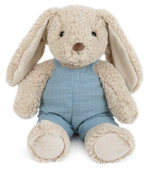The Mon Ami Bramble Bunny - Blue is a plush beige bunny with floppy ears and black eyes, dressed in a light blue romper, sitting upright and exuding huggable charm.