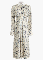 The Floyd Dress by Altuzarra is a long-sleeved, collared shirt dress with a belted waist, crafted from light fabric and adorned with an abstract blue and black animal pattern.