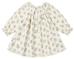 The Baby Girls’ and Girls’ Long Sleeve Isla Dress by Quincy Mae features a cream background with a delicate yellow and gray floral print, ruffled neckline, and lace-trimmed collar and hem. Expertly crafted from woven cotton, this dress offers timeless style and comfort.