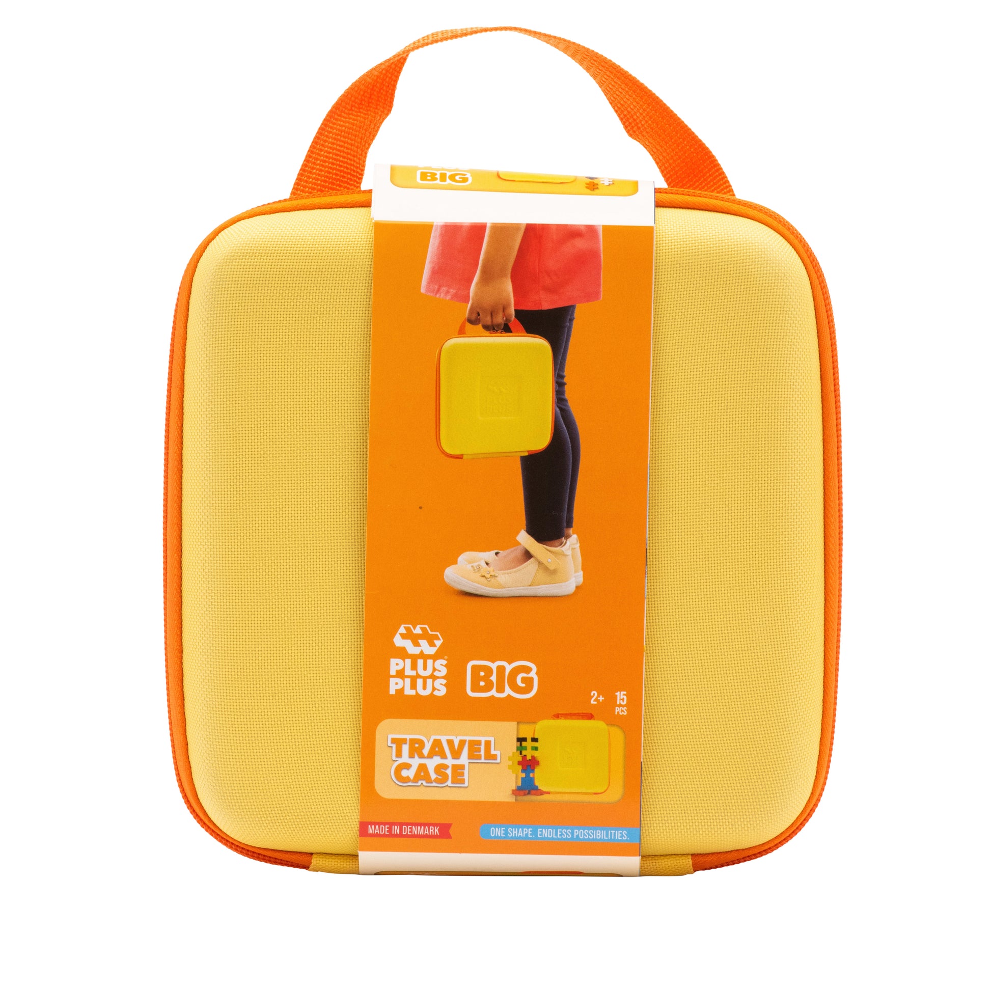 The Plus Plus BIG Travel Case is a yellow and orange STEM toy for ages 2+, featuring a handle and packaging that shows a child holding the case.
