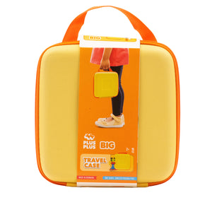 The Plus Plus BIG Travel Case is a yellow and orange STEM toy for ages 2+, featuring a handle and packaging that shows a child holding the case.