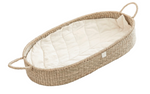 Bebe Bask's Raw Baby Changing Basket Set, made from natural seagrass, has sturdy handles and a padded white lining. Its boho style makes it an heirloom for any nursery.