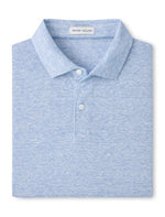 The Sanibel Polo by Peter Millar is a light blue heathered linen-cotton shirt with a collar and two white buttons—an effortless casual essential that elevates any wardrobe.