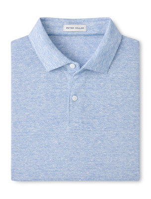 The Sanibel Polo by Peter Millar is a light blue heathered linen-cotton shirt with a collar and two white buttons—an effortless casual essential that elevates any wardrobe.