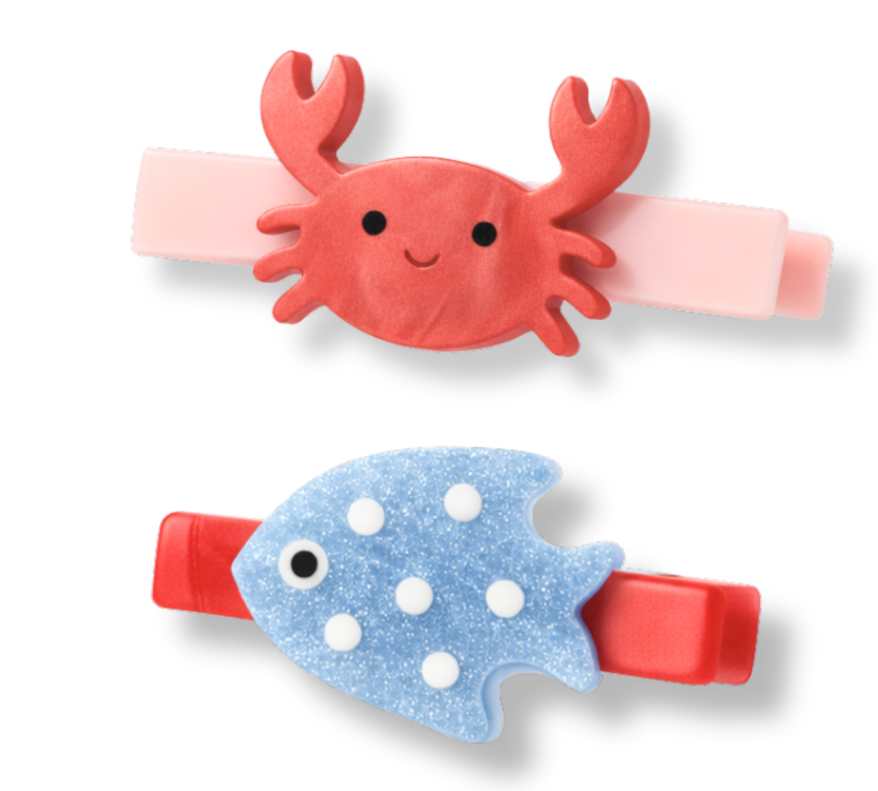 Lillies & Roses Ocean Friends Crab Hair Clips feature two handmade clips: one showcasing a red smiling crab and the other a blue fish with charming white spots. Both clips have rectangular bases, making these adorable accessories perfect for ocean-loving friends and sea-themed styles.