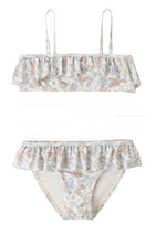 The Rylee & Cru Girls' Parker Bikini features delicate floral print on a light background, thin straps, and is made from UPF 50+ swimwear fabric for extra sun protection.
