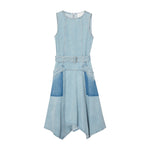 The Ghost Patch Midi Denim Dress by 3.1 Phillip Lim features a sleeveless, light blue design with a fitted top, adjustable belt, flared skirt, handkerchief hem, and two large front pockets.